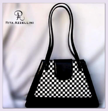 L'azienda Rita Azzellini propone una pregiata linea di borse, uniche per stile e manifattura artigianale. Infatti, ogni collezione firmata Rita Azzellini annovera una variet� di pezzi che sposano classico e moderno, un connubio di fantasia ed eleganza esaltato dall'alta qualit� del materiale utilizzato: "fine pellame di capretto", interamente lavorato a mano; da tutto questo ne deriva un prodotto finale che va ben al di l� del puro accessorio per un pubblico femminile. Il marchio Rita Azzellini garantisce, rispetta e preserva il "buon gusto" e la tradizione nel mondo del prodotto made in Italy