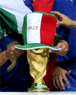 WE ARE THE FOOTBALL SOCCER CHAMPIONS... For only the second time in World Cup history, the final was settled on a penalty shootout. Fabio Grosso, the goal hero in the semifinal against Germany, scored the winning penalty for four-time champions Italy... Materazzi had been busy at both ends of the field. The Italian defender conceded a penalty and scored a goal in the first half to even the match against France at 1-1 in the World Cup final